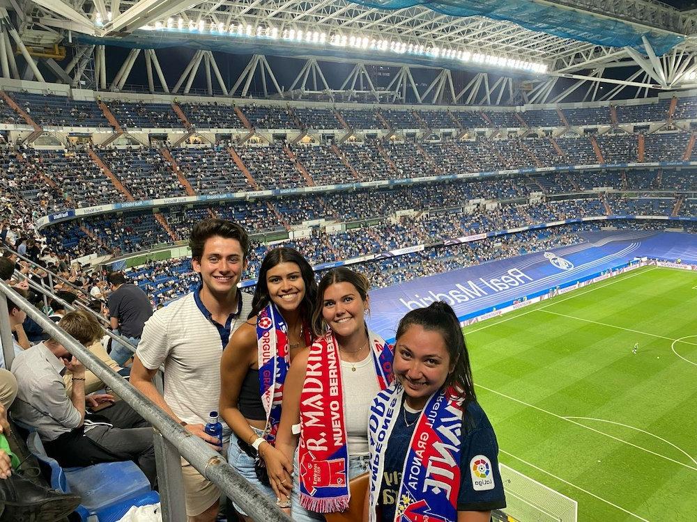 students in a soccer stadium